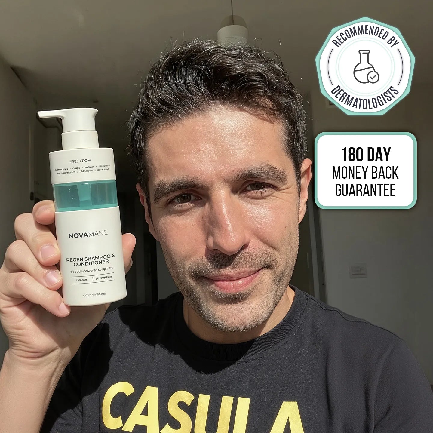 Man holding a bottle of Nova Mane Regen 2 in 1 shampoo product with promotional text and a recommended by dermatologist badge