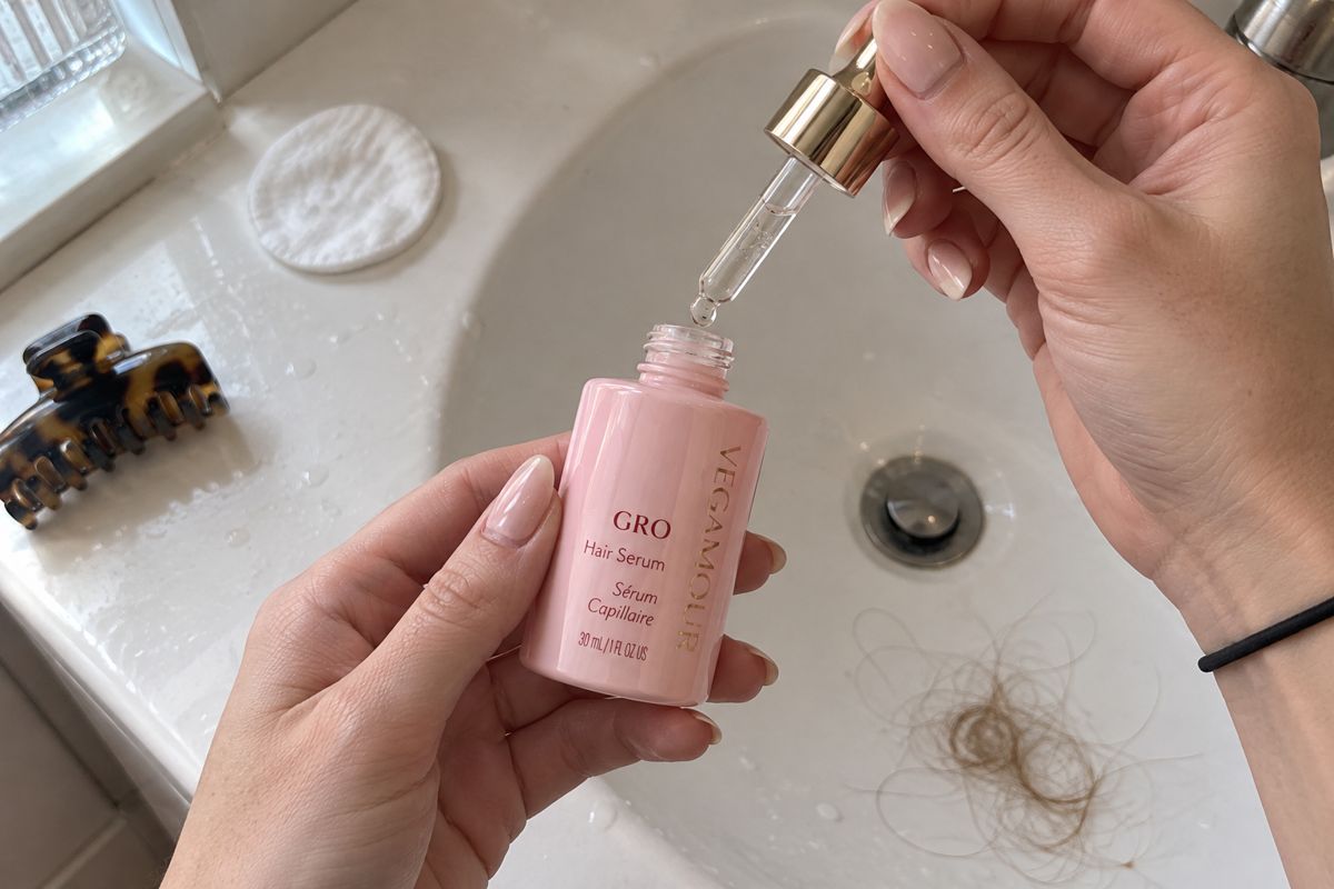 My old serum over the sink, and the hair I lost that morning