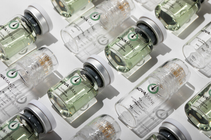 Multiple vials labeled 'NOVA' arranged on a light background